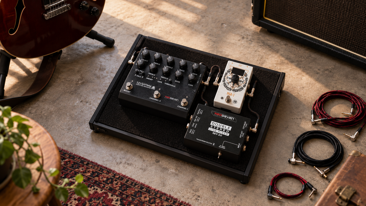 Overhead view of RedSeven Leviathan Preamp, NGR-1 and Double Stereo Line Mixer on a pedalboard