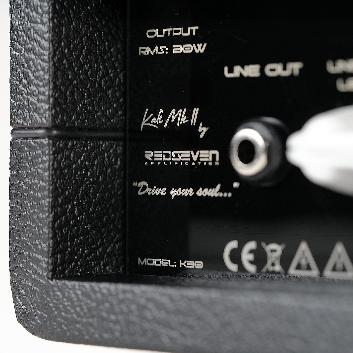 Detail shot of illuminated preamp tubes inside the RedSeven Kali MkII amplifier