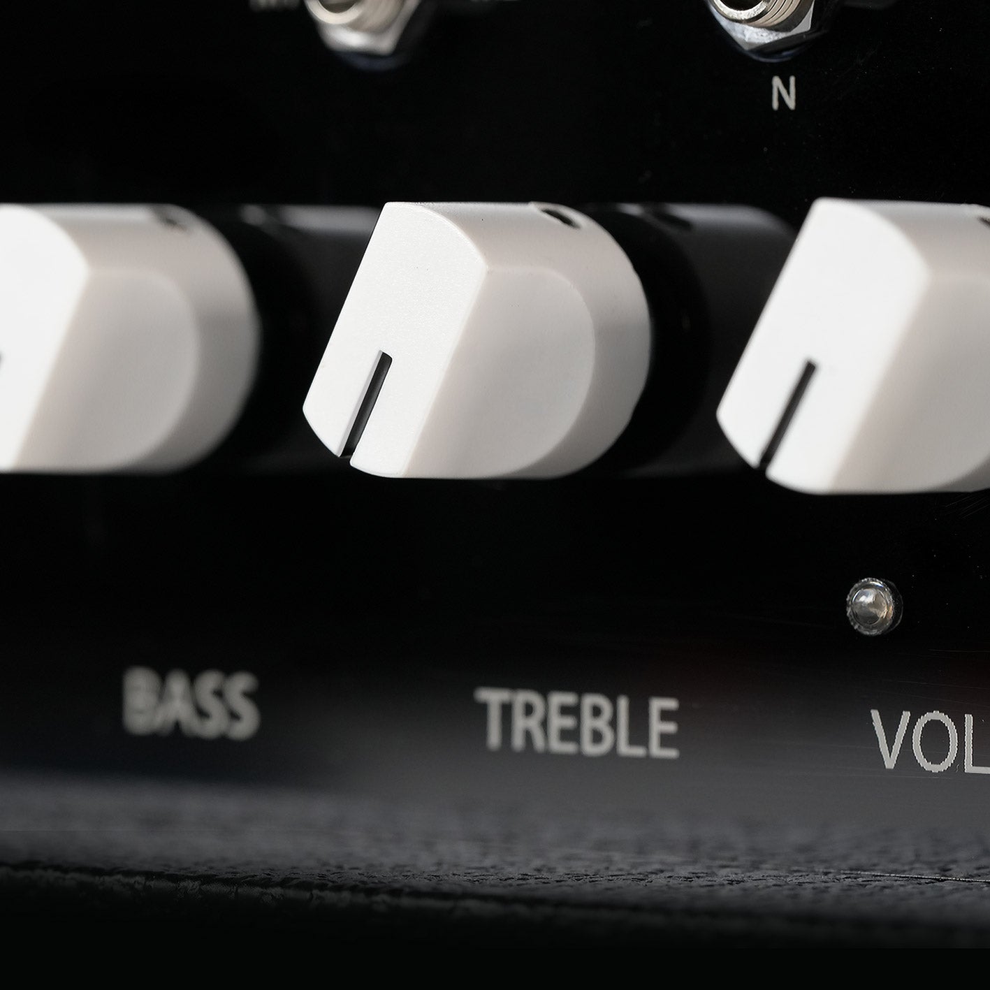 Close-up of treble and bass knobs on the RedSeven Duality guitar amplifier