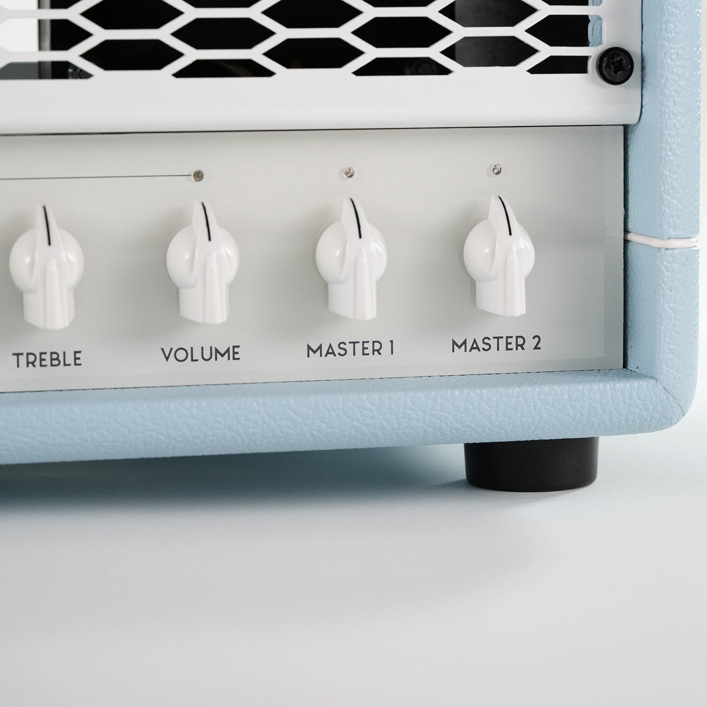 Leviathan Celeste Edition — front left corner close-up, white knobs and blue tolex texture detail