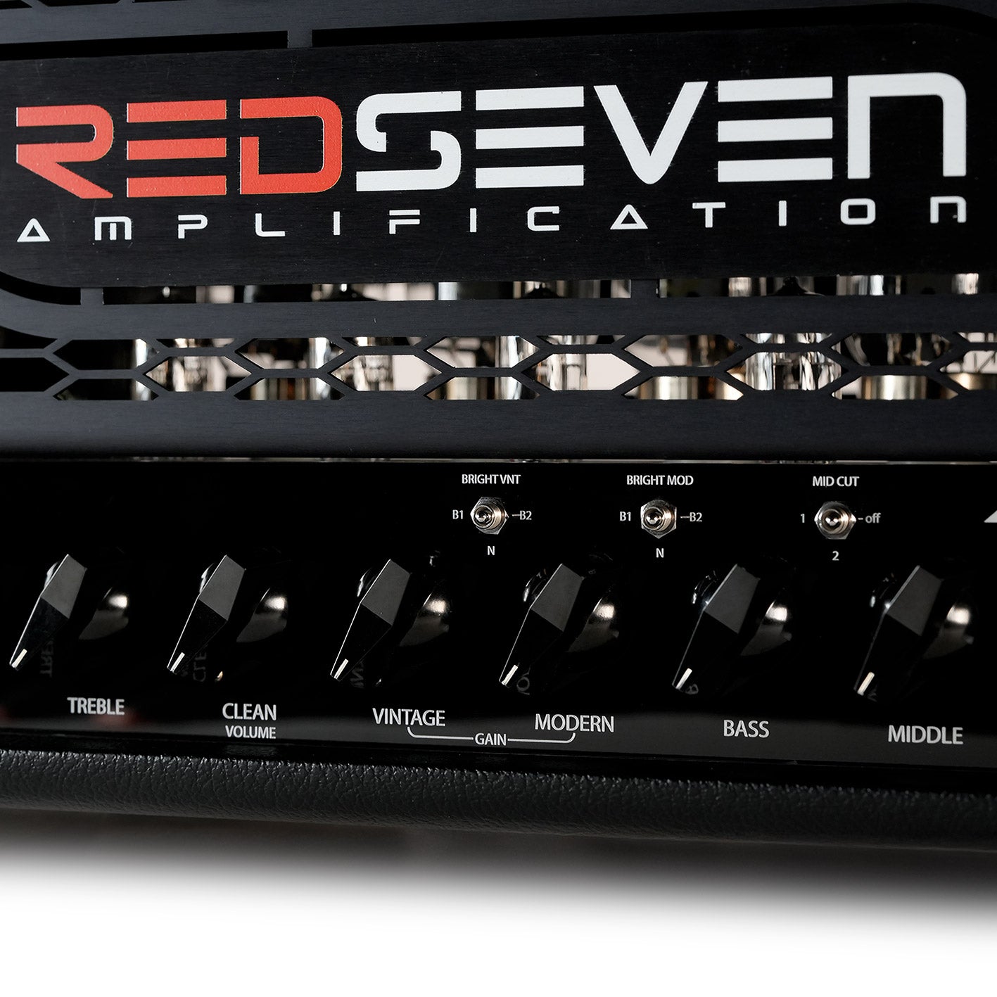 Close-up view of Hybrid 100 amplifier front panel controls and RedSeven logo