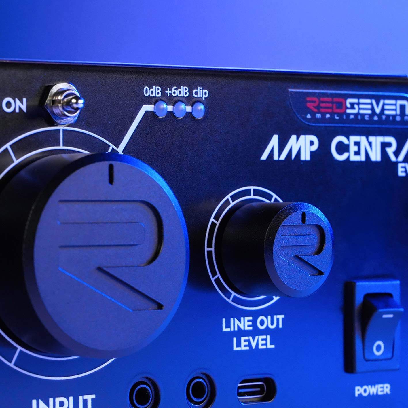 Detail view of the RedSeven Amp Central EVO line out level and input controls on the front panel