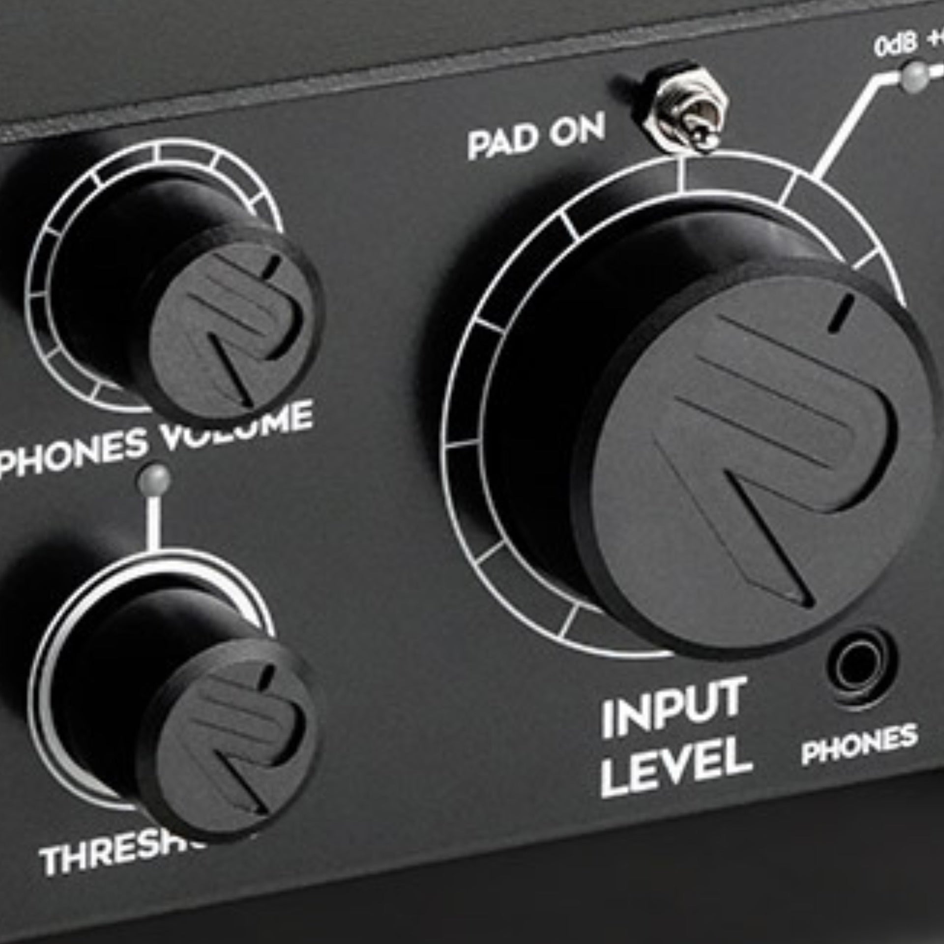 Close-up of the RedSeven Amp Central EVO front panel showing input level knob, threshold, and headphone volume controls