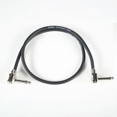 RedSeven x Cordial PATCH CABLES, right angle guitar pedalboard patch cable on white background