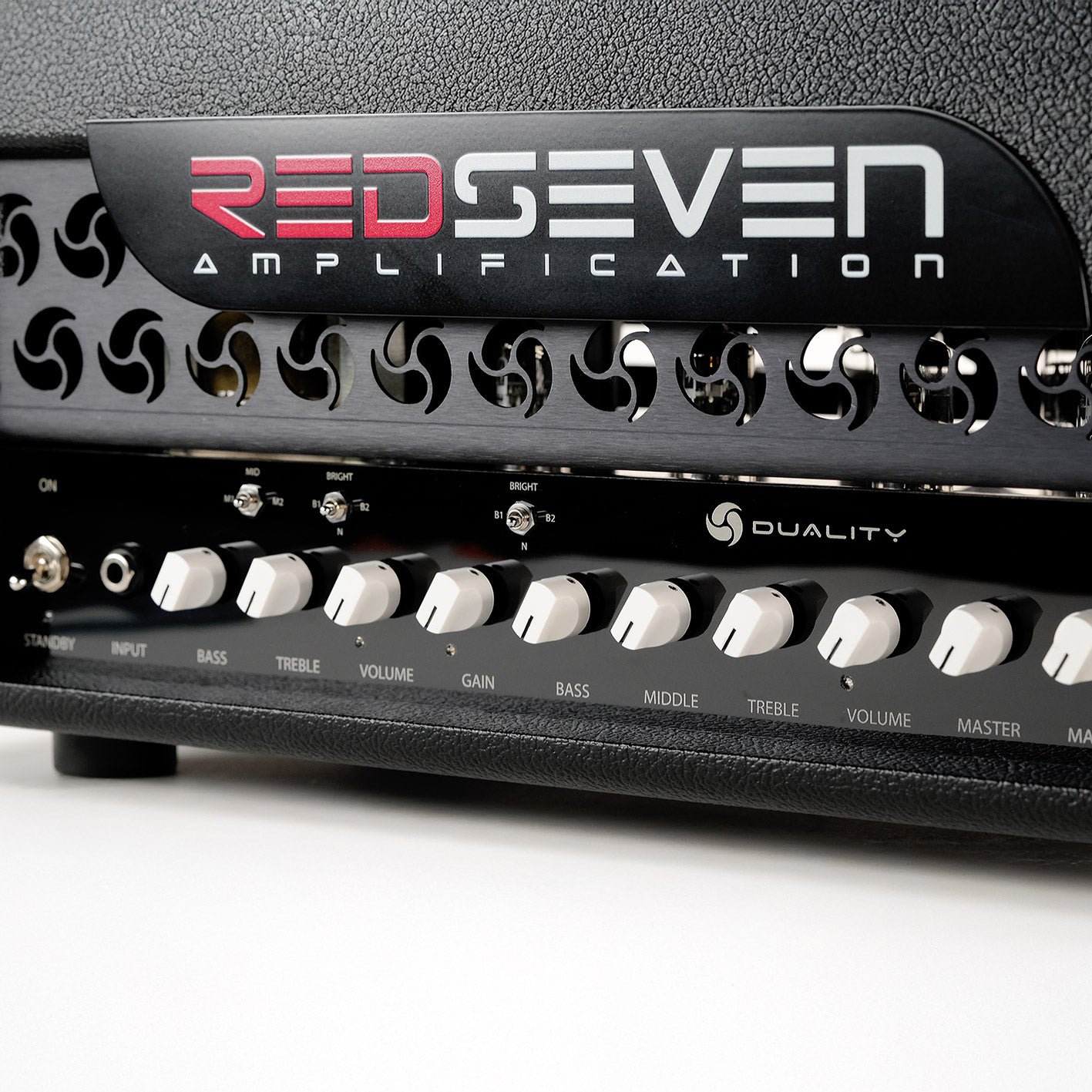 Detail of the RedSeven Duality amplifier control panel and white knobs