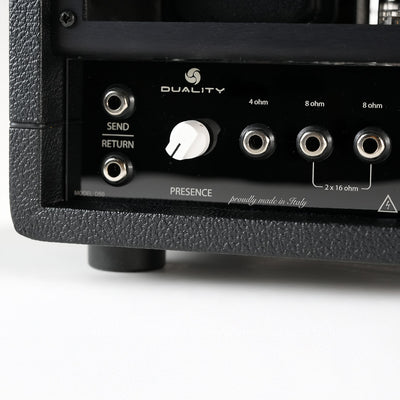 Detail of the RedSeven Duality amplifier presence knob and speaker outputs